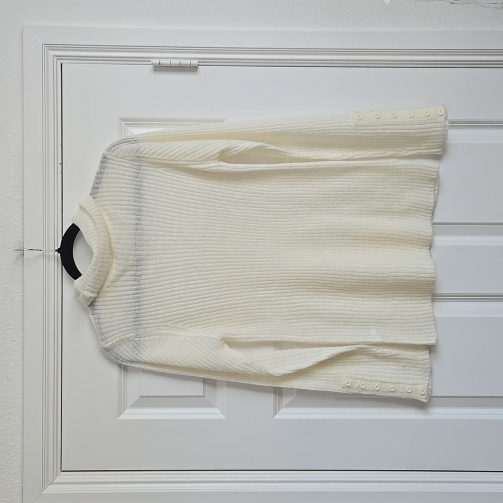Giana Bini turtle neck in an off white color